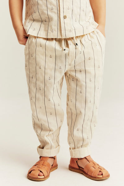Kids cream striped trousers with sailboats