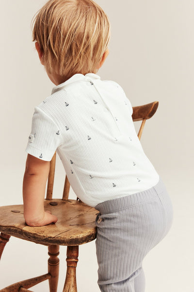 Baby white ribbed bodysuit with sailboats