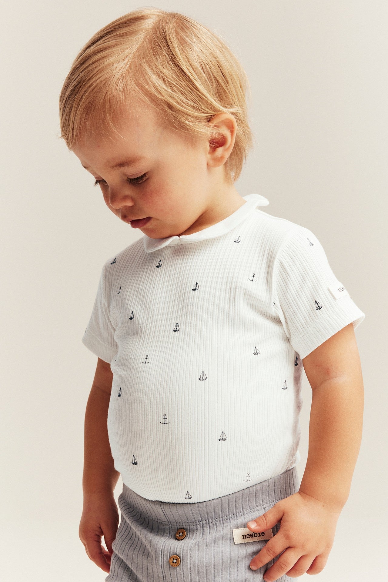 Baby white ribbed bodysuit with sailboats