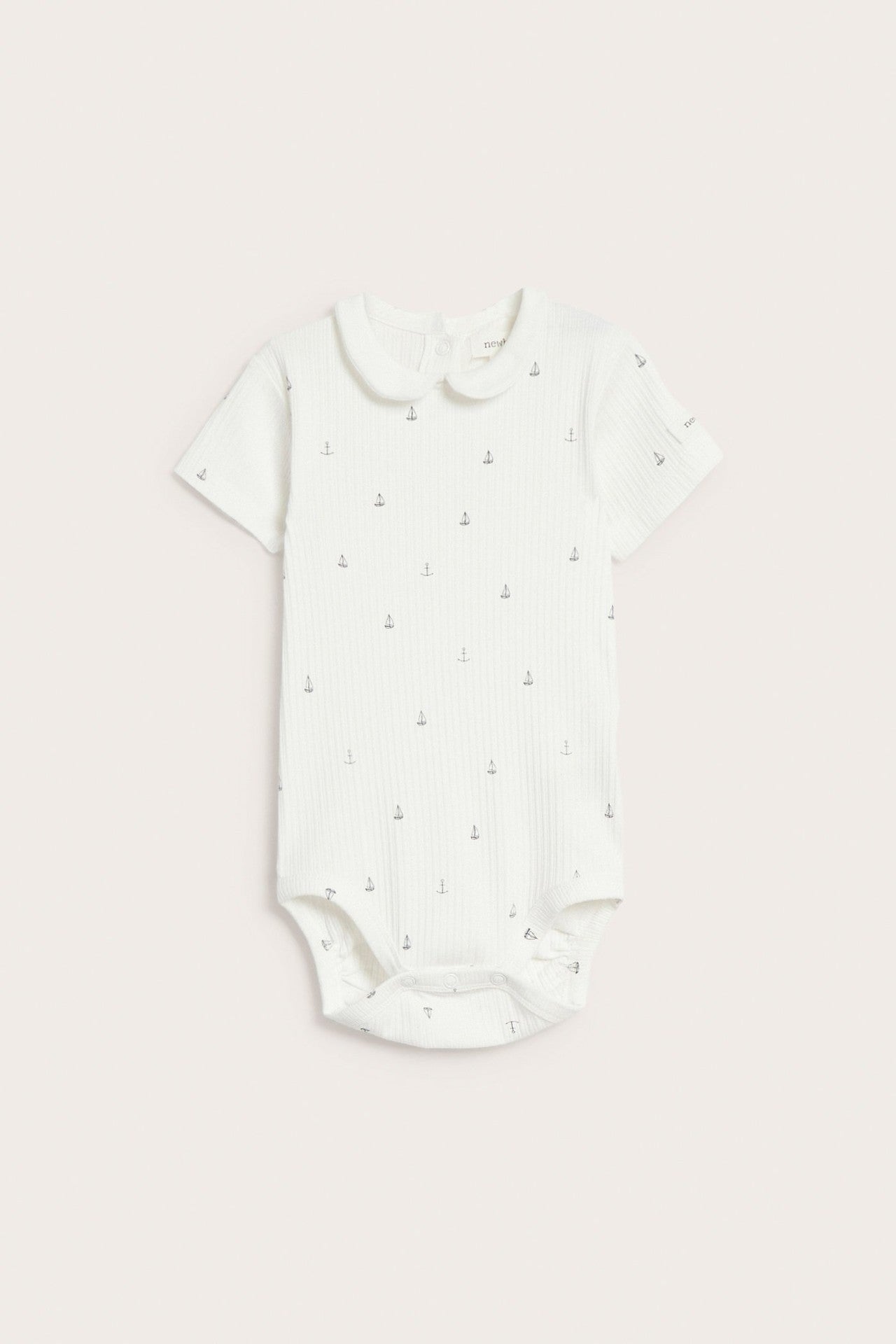 Baby white ribbed bodysuit with sailboats