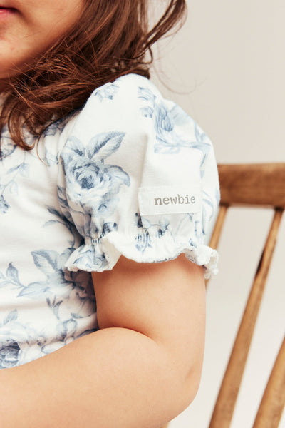 Baby white floral short sleeve bodysuit
