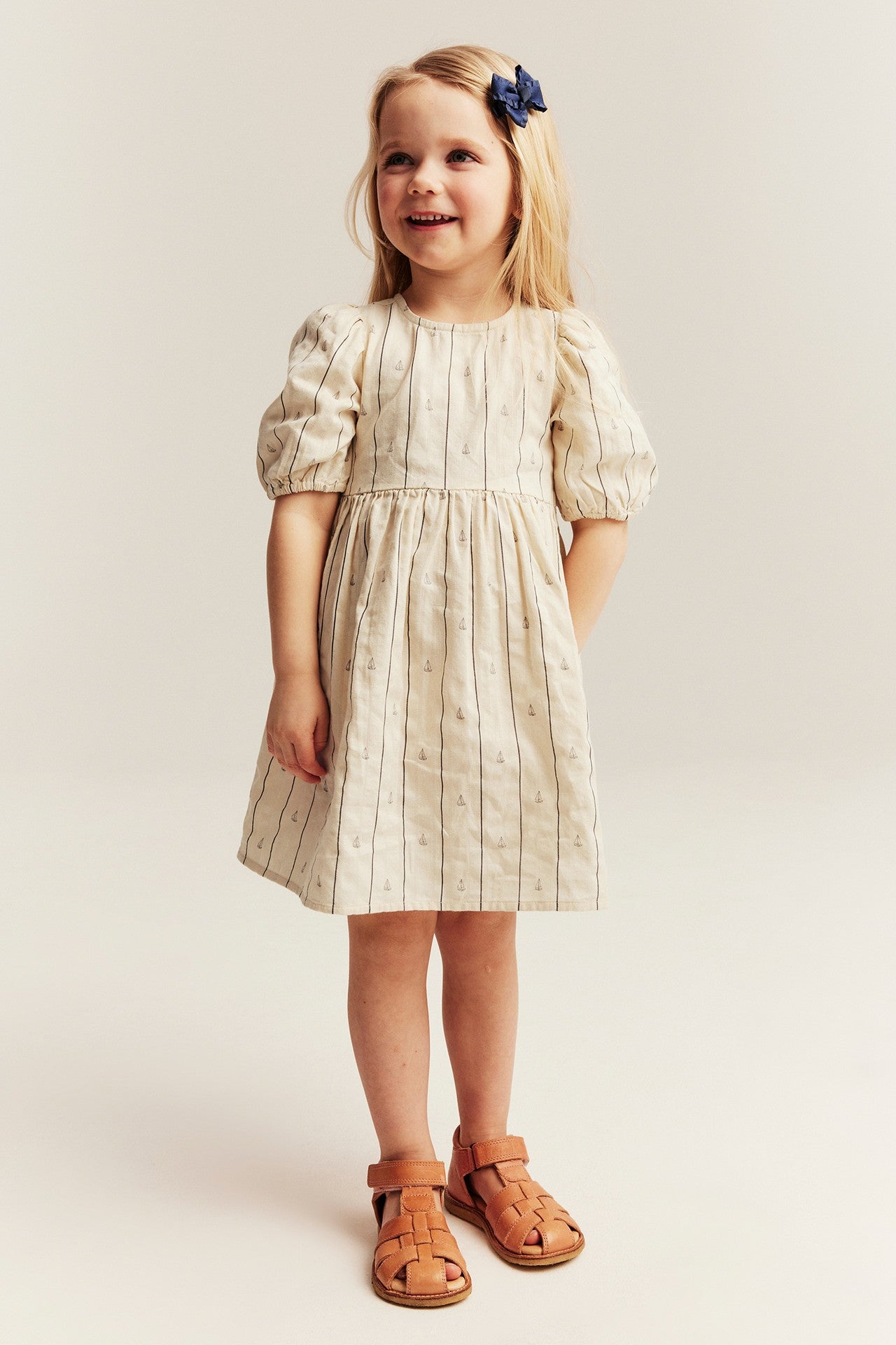 Kids cream dress with sailboats