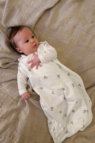 Baby white sleeping bag with bear print