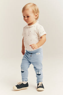 Baby blue ribbed leggings with boat appliqué