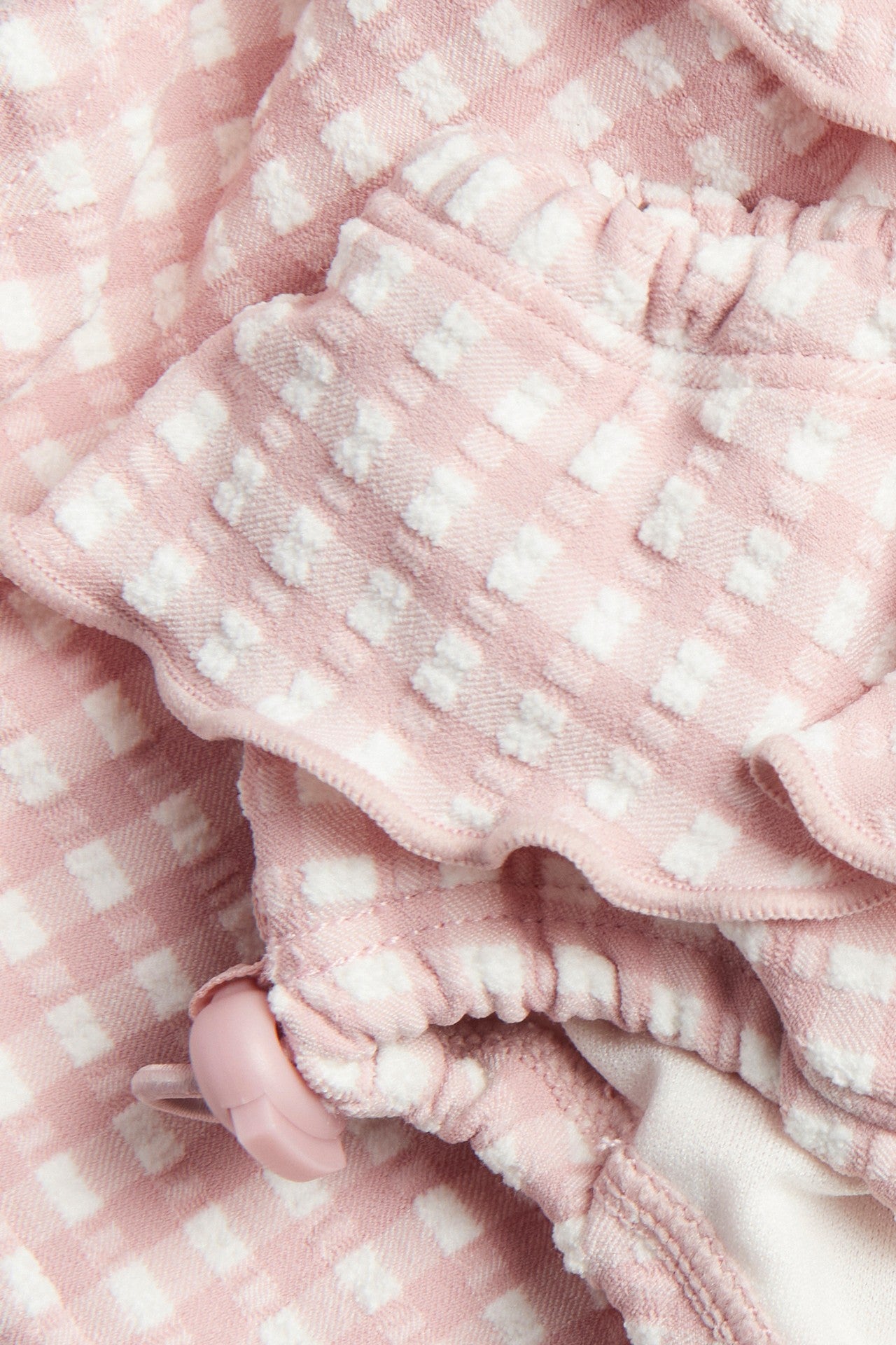 Baby pink checkered swim shorts