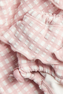 Baby pink checkered swim shorts