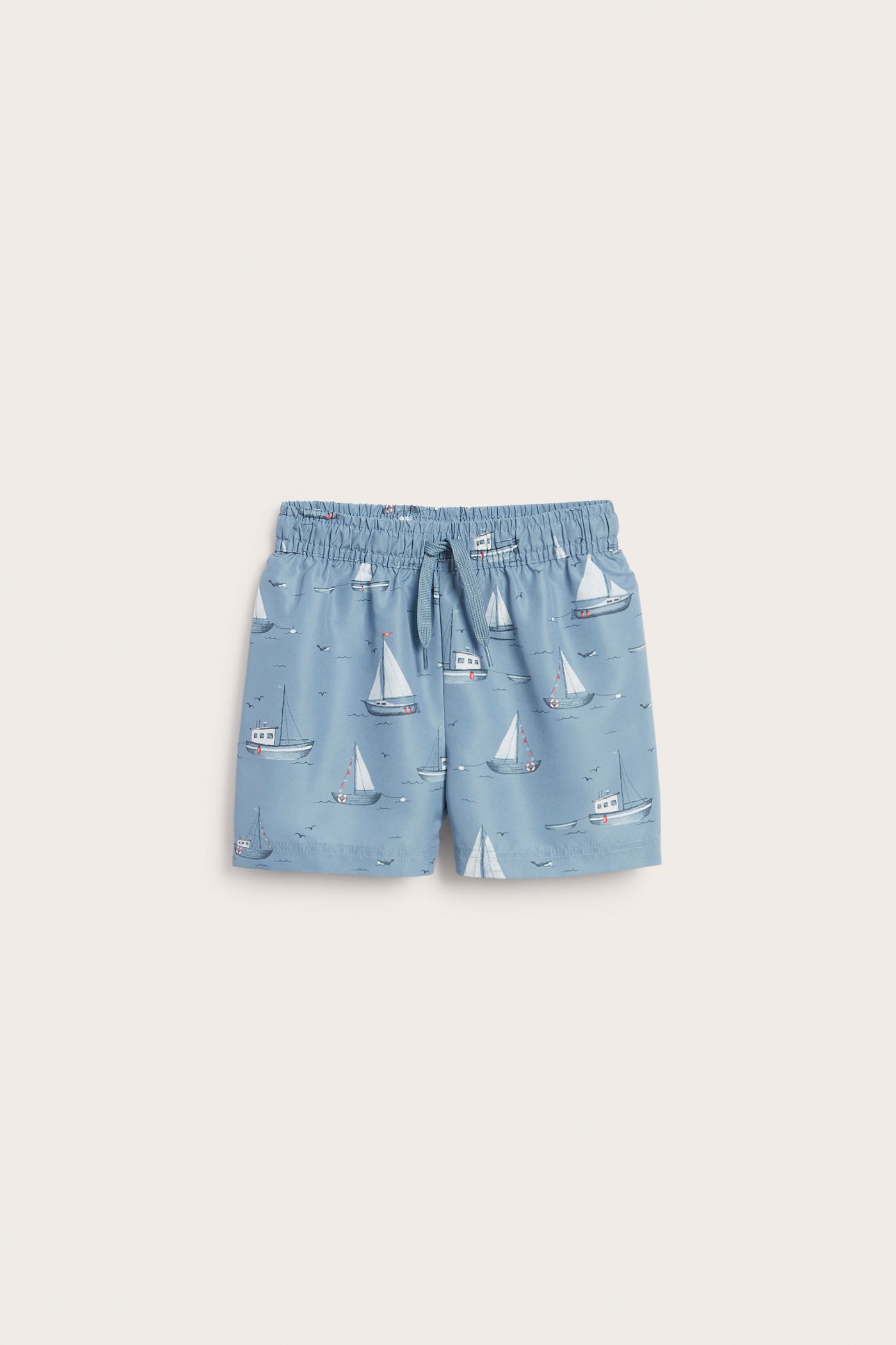 Baby & Kids’ blue swimming trunks with boat pattern