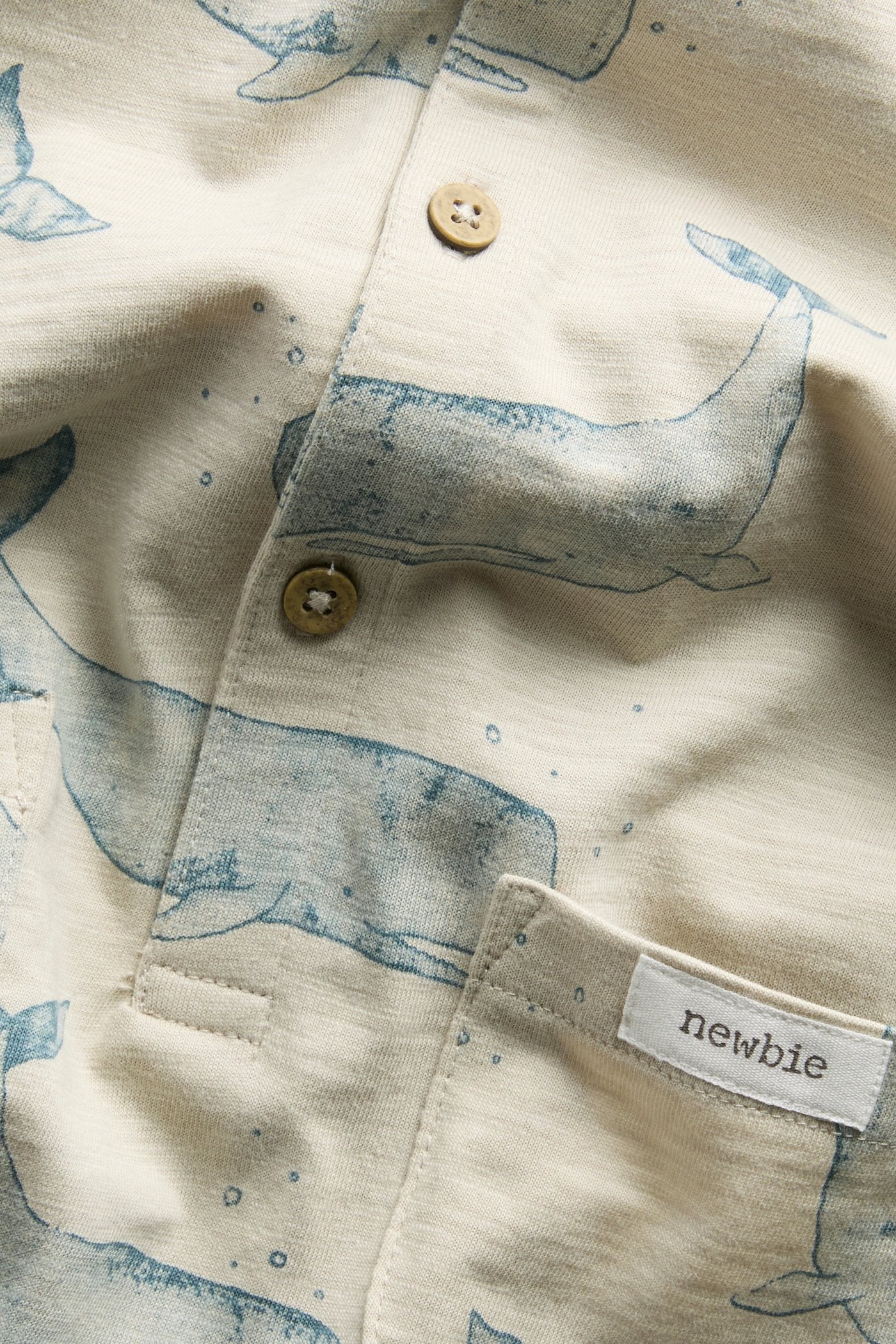 Baby whale‑print romper