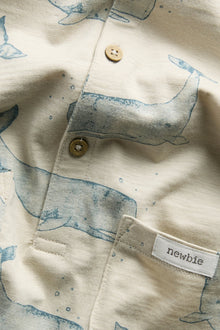 Baby whale‑print romper