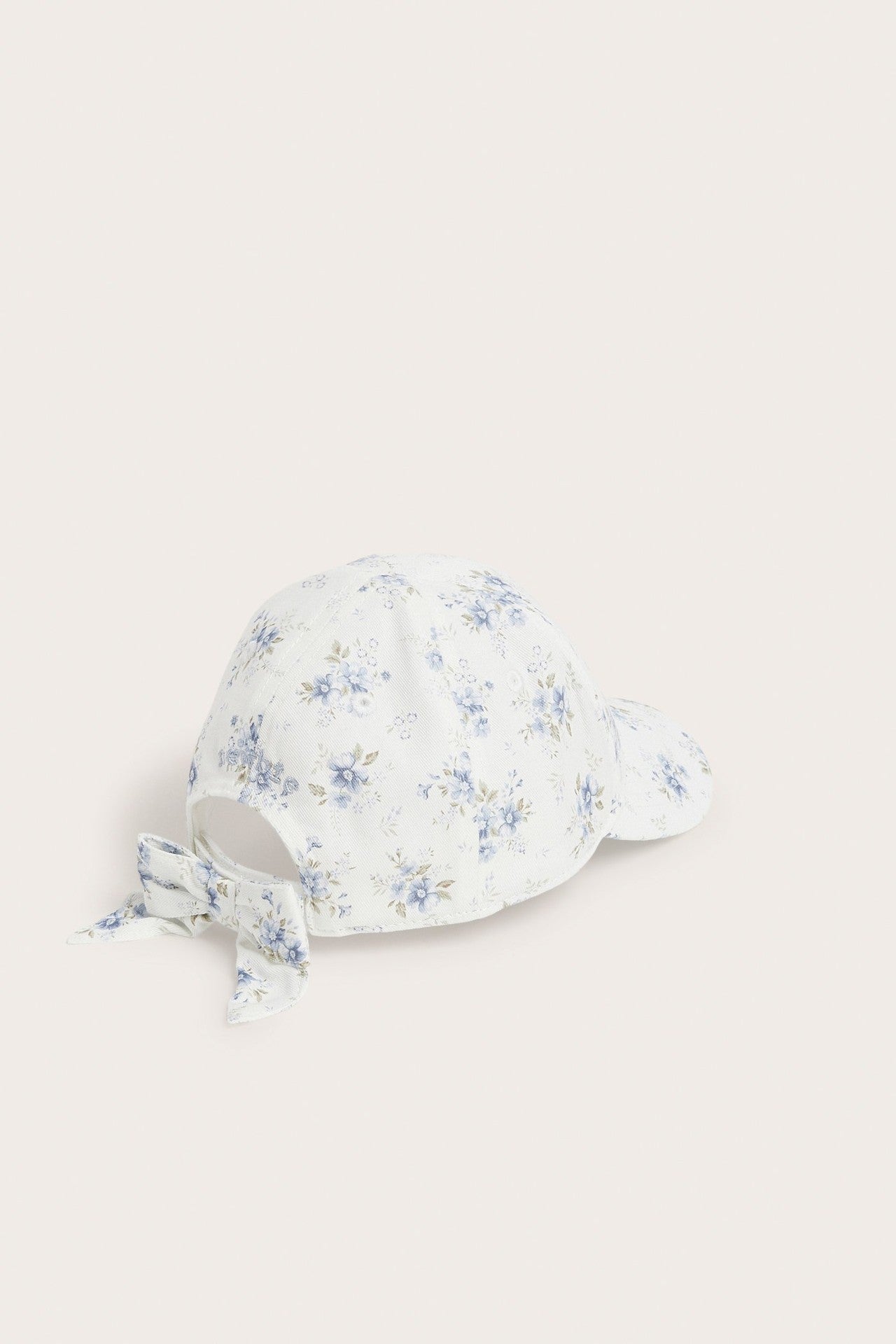 Baby white floral cap with bow