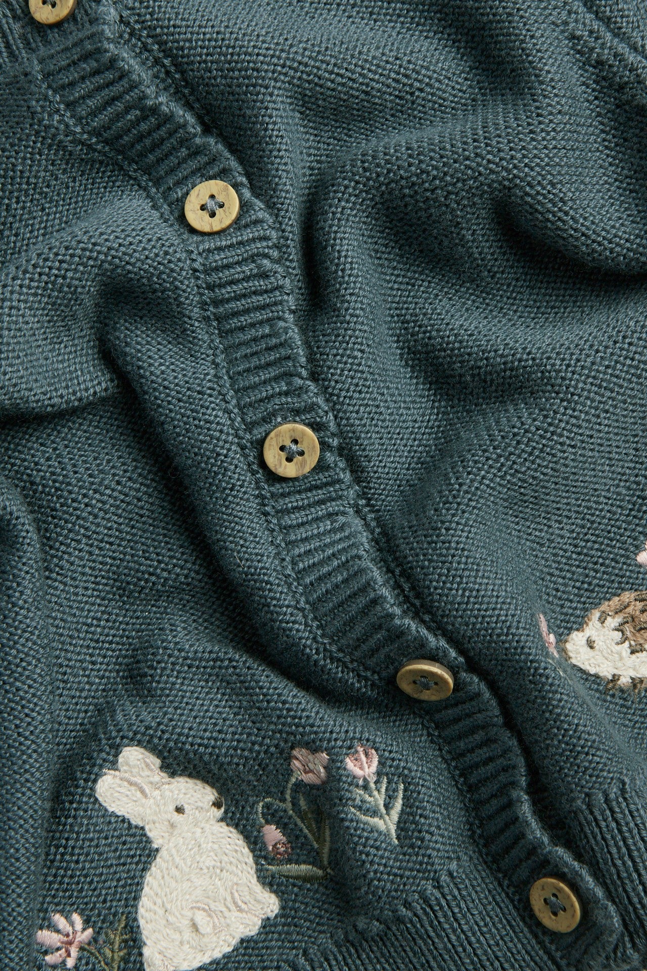 Baby dark green knitted cardigan