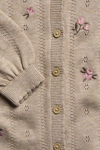 Baby beige knitted and patterned jumpsuit
