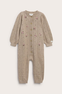 Baby beige knitted and patterned jumpsuit