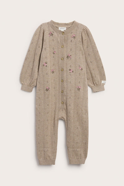 Baby beige knitted and patterned jumpsuit