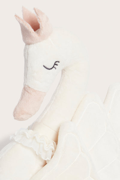 Swan‑shaped white cushion with crown
