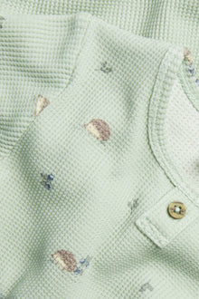 Baby green hedgehog-patterned bodysuit