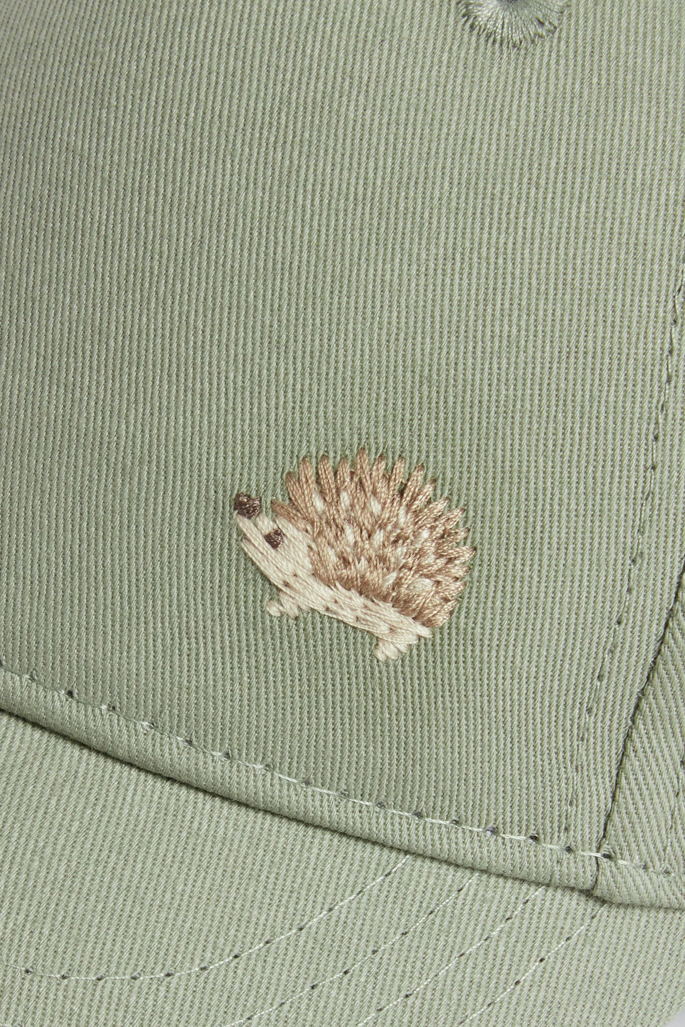 Baby & kids’ green cap with hedgehog embroidery