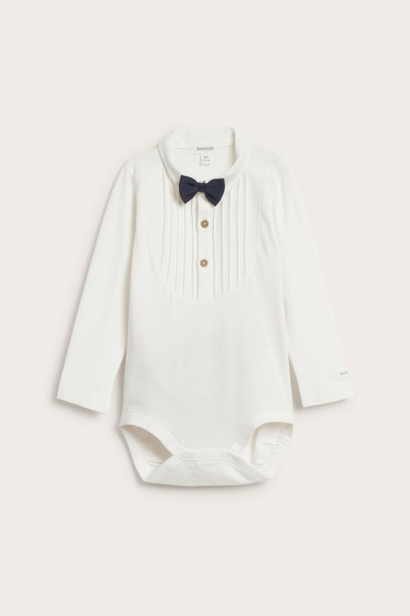 Baby white long-sleeved bodysuit with bow tie