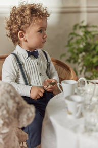 Baby white long-sleeved bodysuit with bow tie