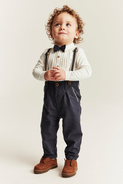 Baby white long-sleeved bodysuit with bow tie