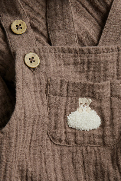 Baby muslin dungarees with teddy bear