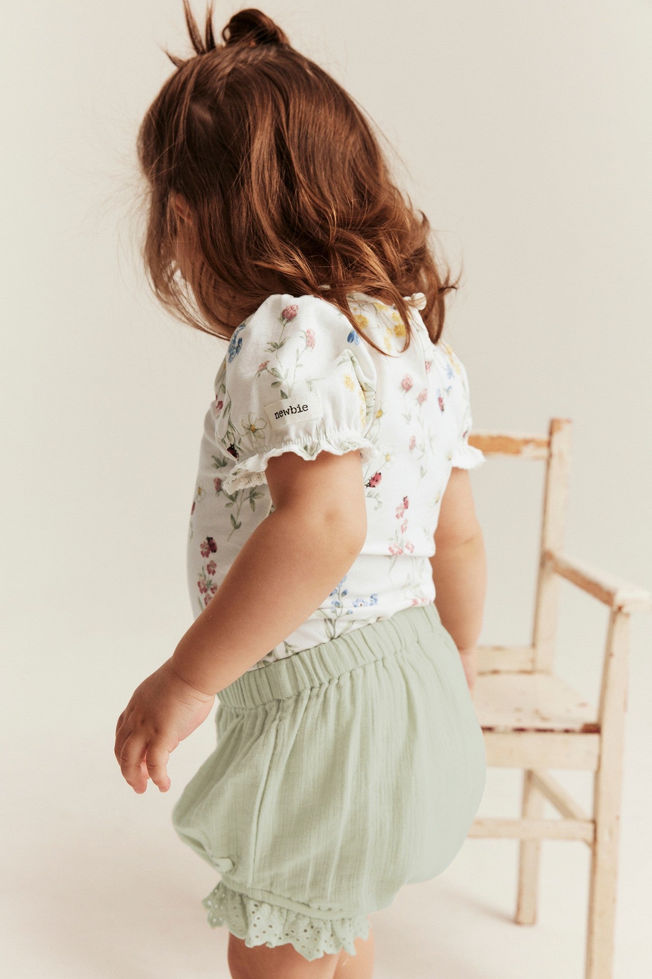 Baby floral body with puff sleeves
