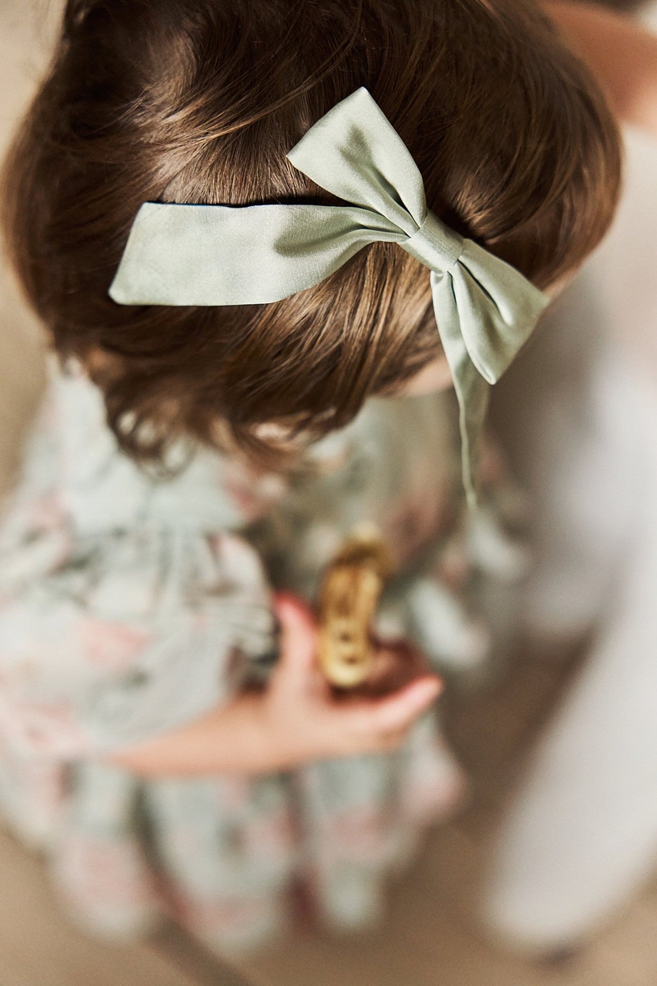 Kids green hair clip with bow
