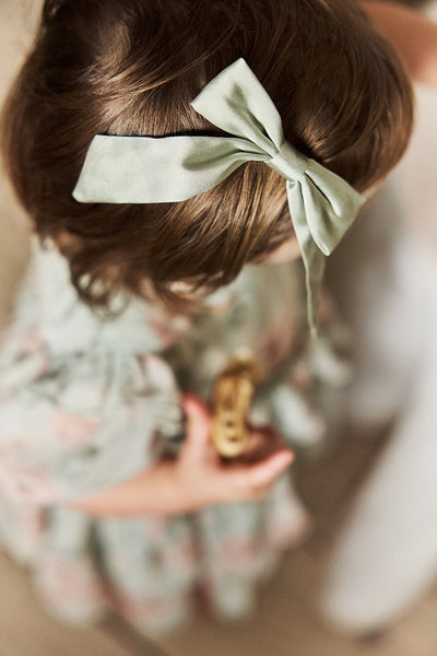 Kids green hair clip with bow