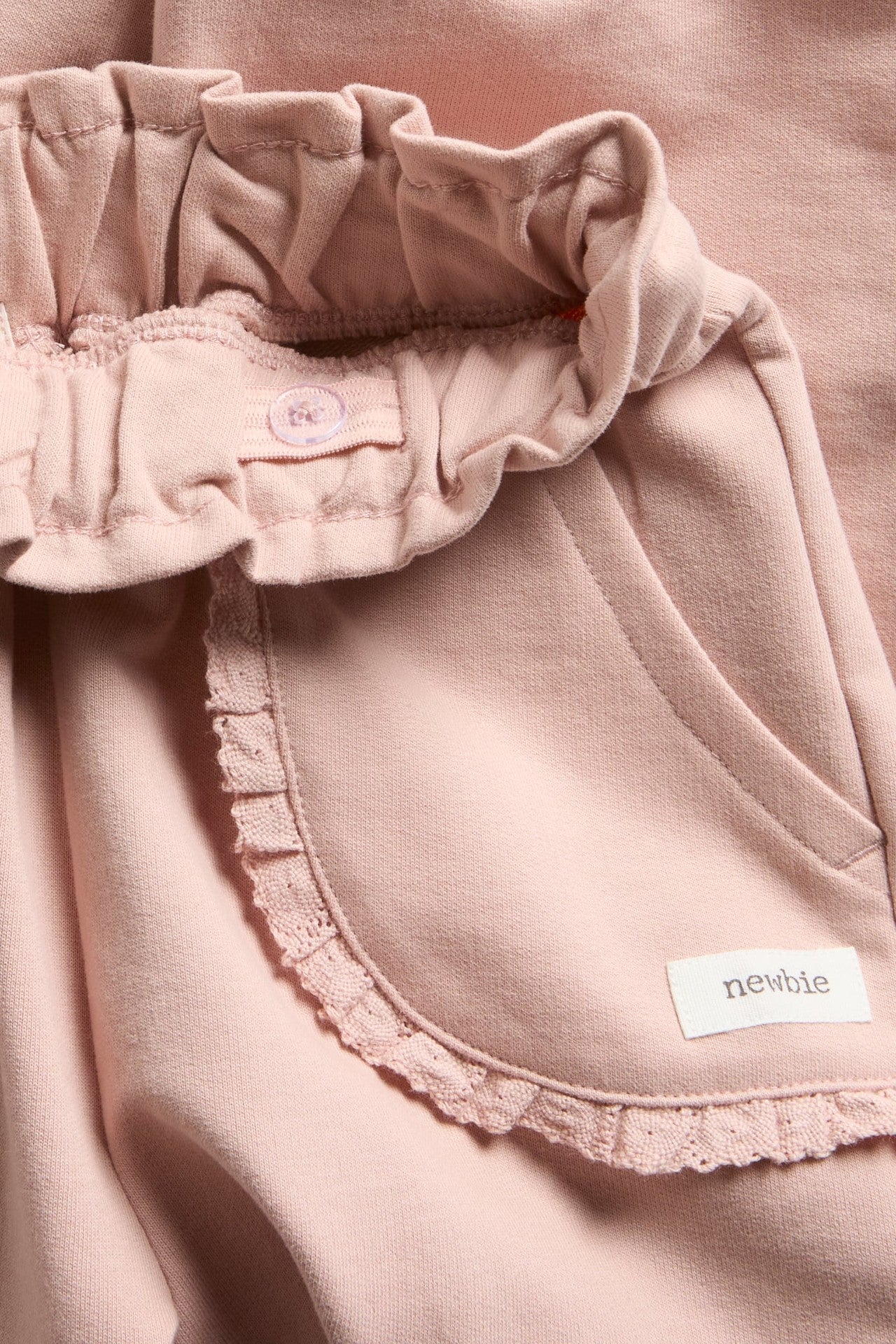Kids jogging bottoms with lace details
