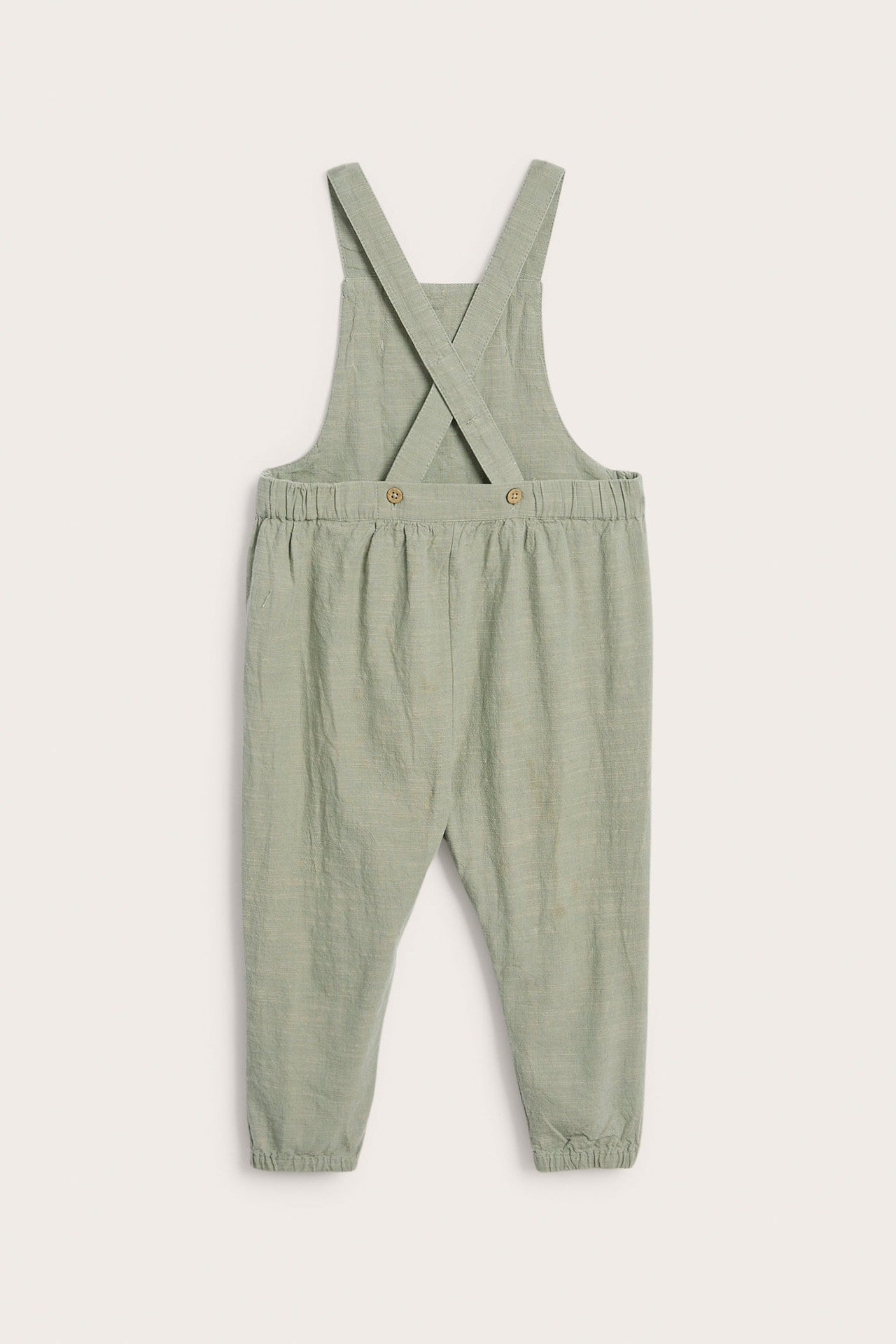 Baby green dinosaur dungarees
