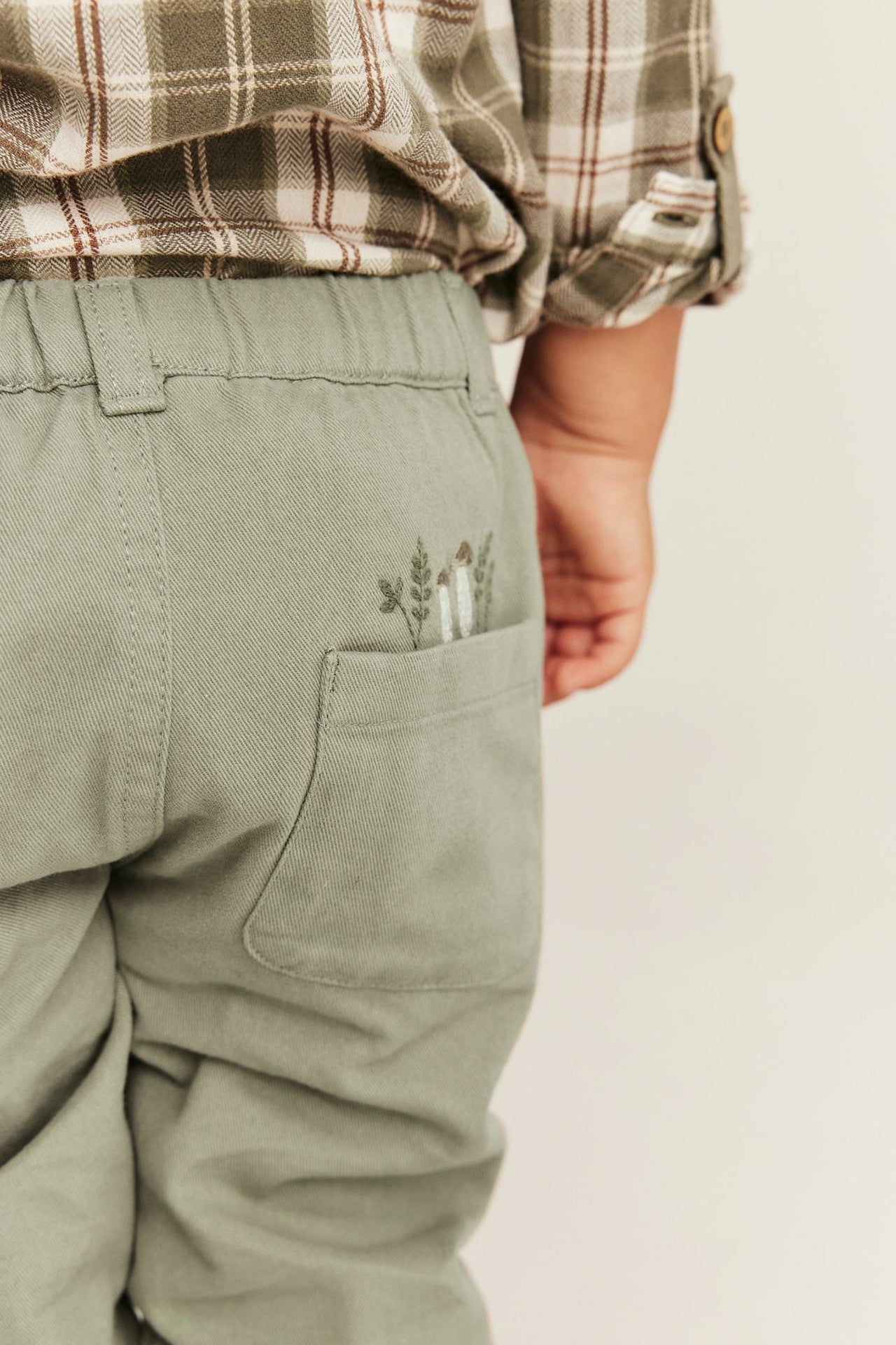 Baby green trousers with embroidery