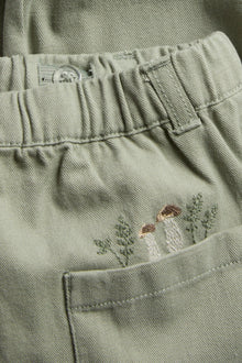 Baby green trousers with embroidery