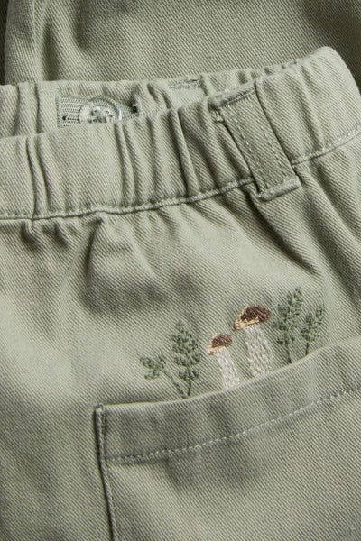 Baby green trousers with embroidery