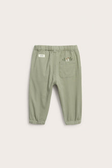Baby green trousers with embroidery