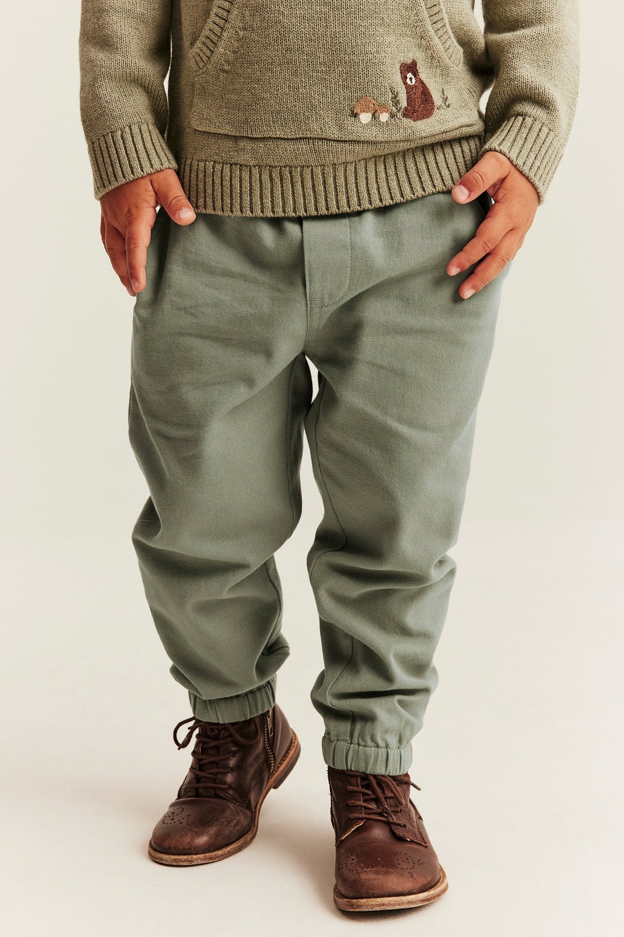Kids green trousers with embroidery