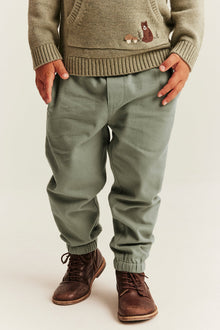 Kids green trousers with embroidery