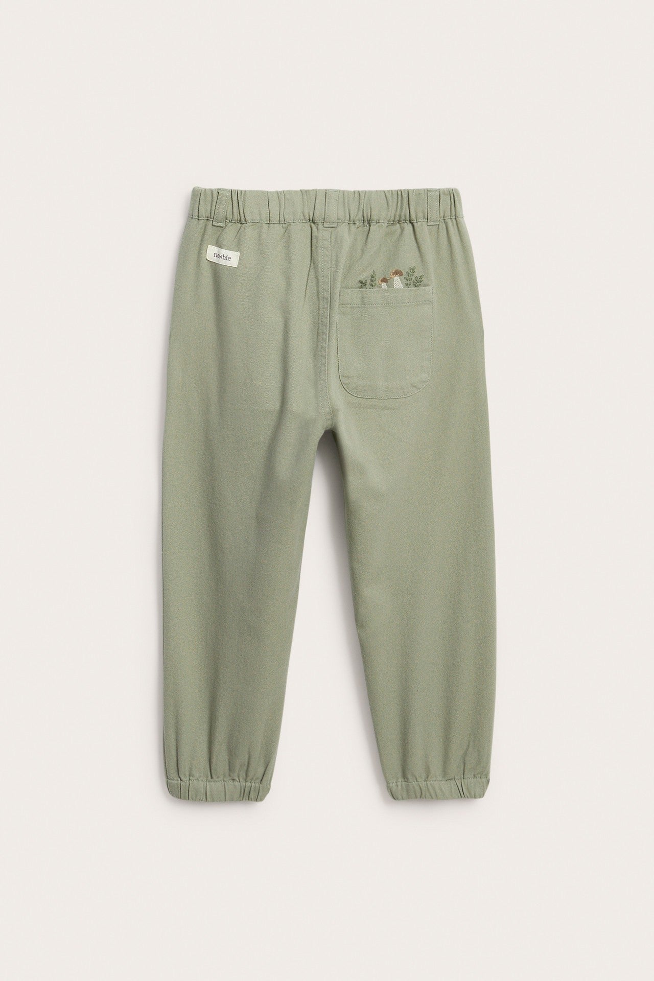 Kids green trousers with embroidery