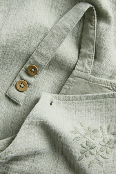 Baby dungarees with lace frill