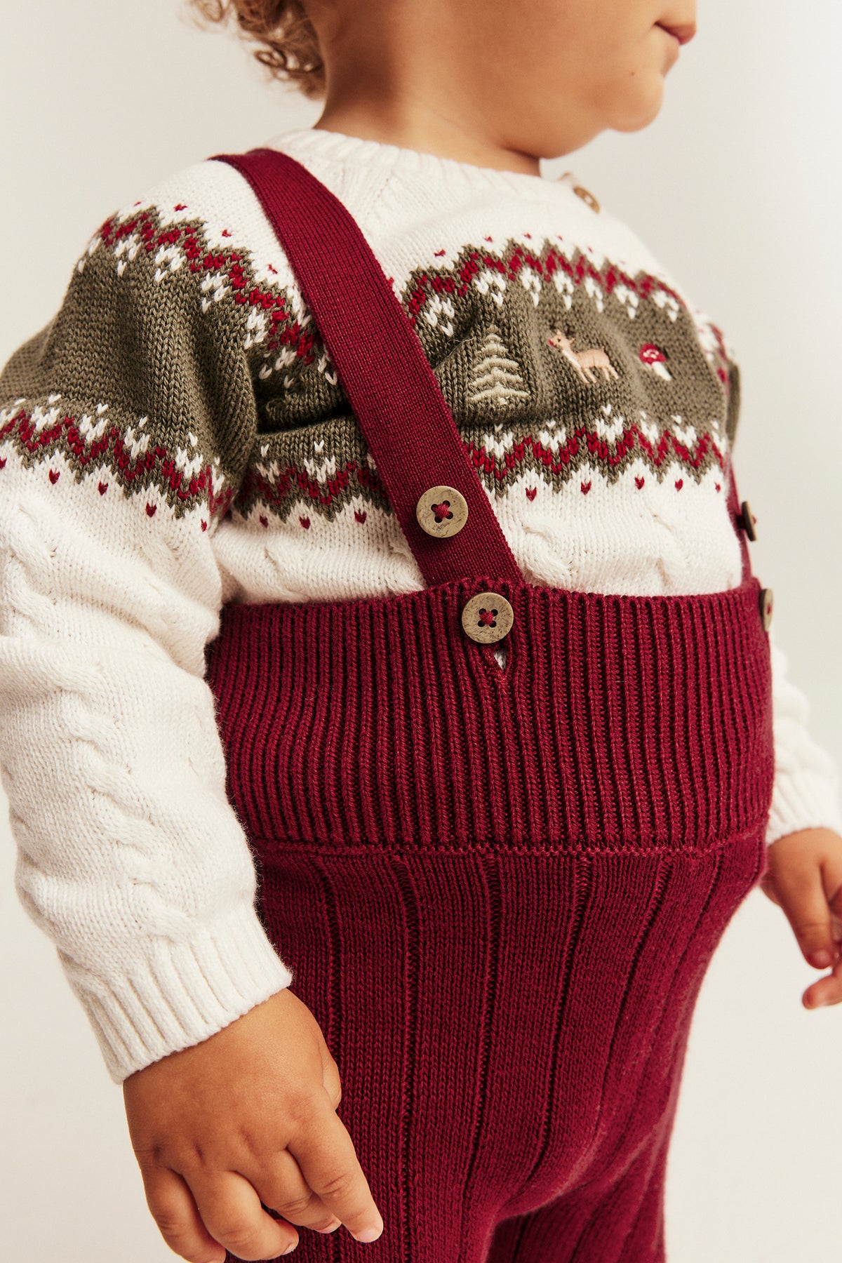 Baby red knitted leggings with braces