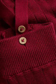 Baby red knitted leggings with braces