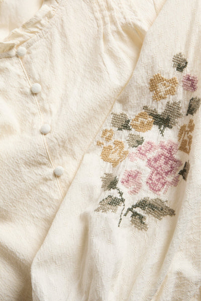 Women's embroidered peplum blouse
