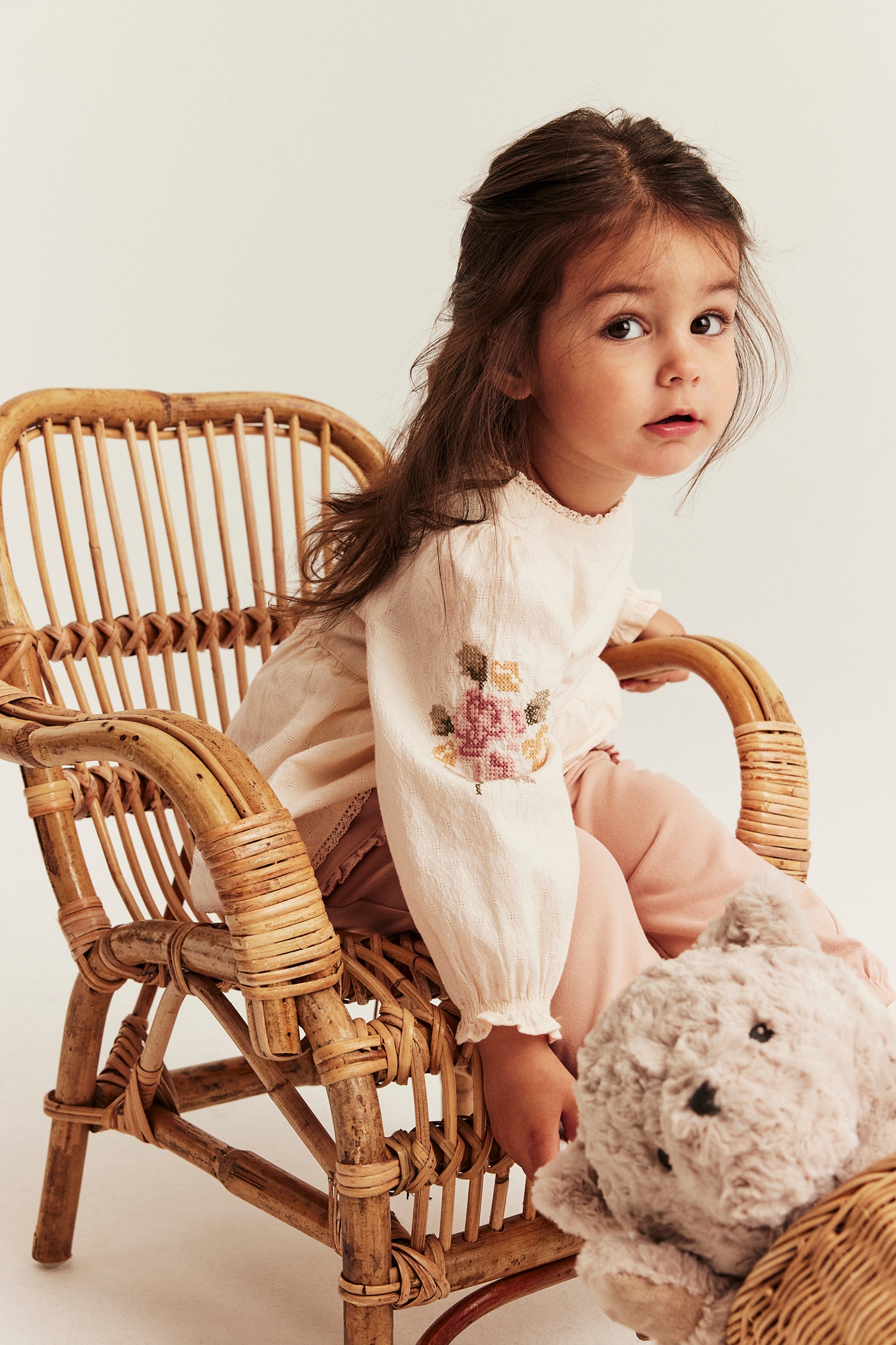 Baby bodysuit with floral embroidery
