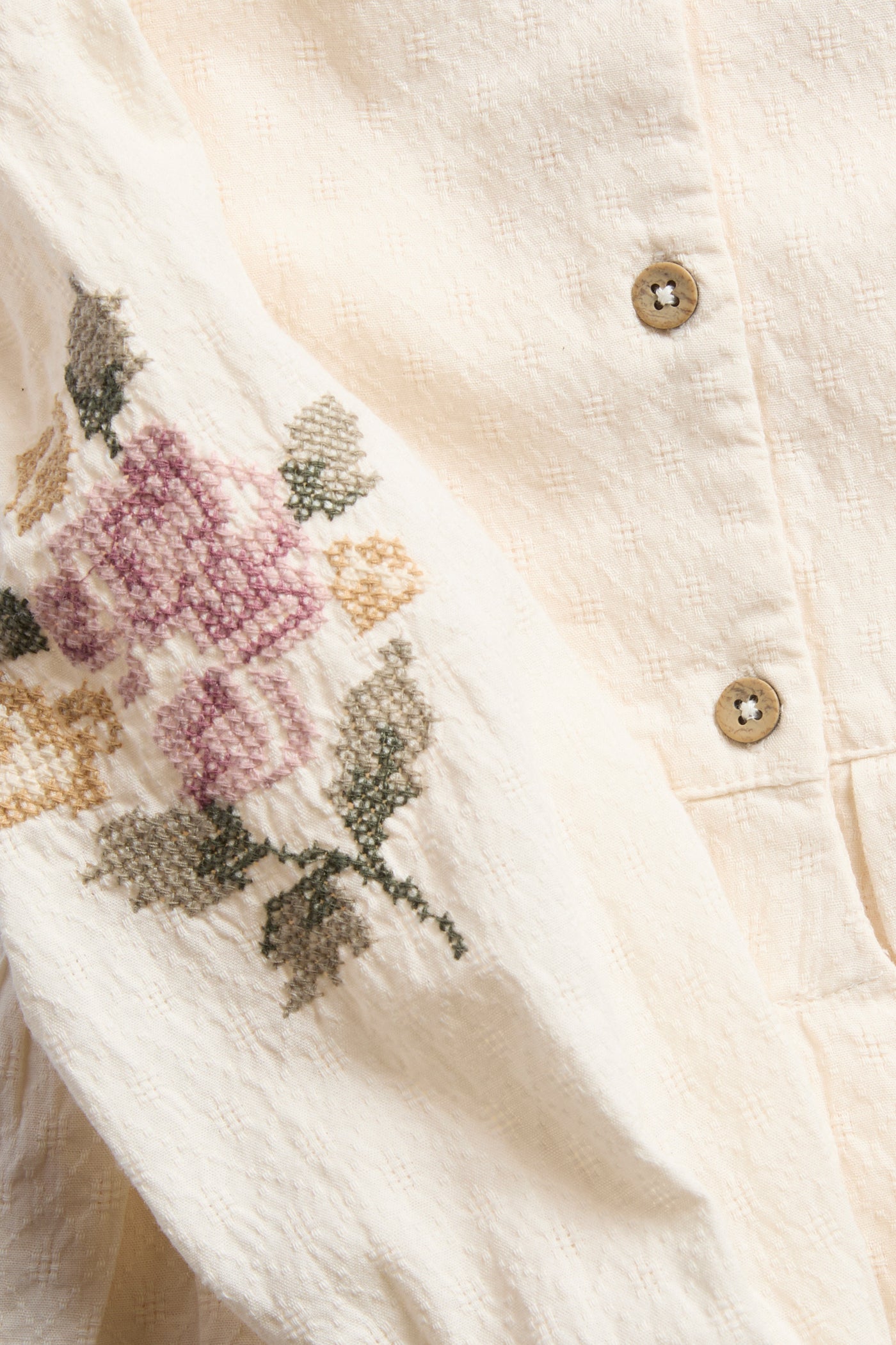 Baby bodysuit with floral embroidery