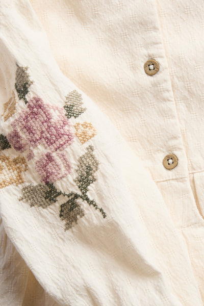 Baby bodysuit with floral embroidery