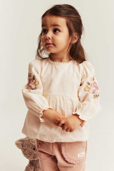 Baby bodysuit with floral embroidery