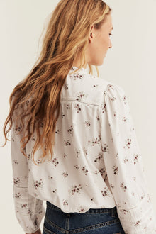 Women’s white floral blouse