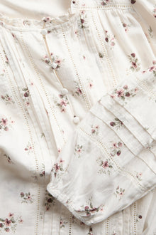 Women’s white floral blouse