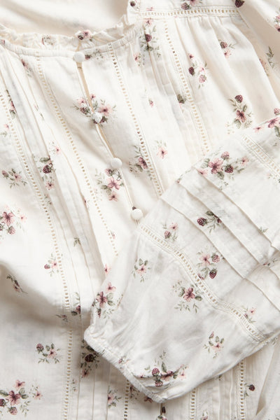 Women’s white floral blouse