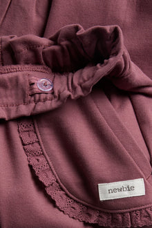 Baby jogging bottoms with lace details