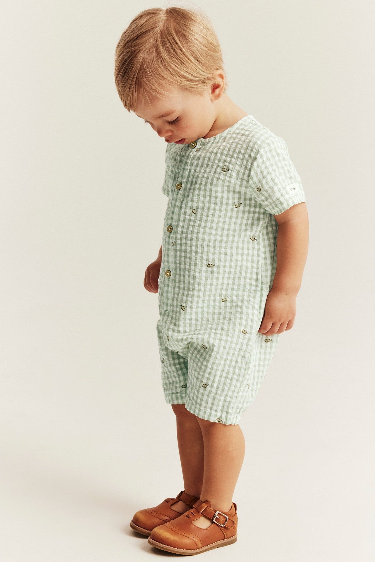 Baby checked romper with bee motif